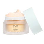 PÜR Tropical C Brightening Vitamin C & Peptide Moisturizer jar with soft peach cream texture and white lid, shown open to reveal the lightweight formula.