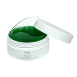 Open jar of PUR Mellow Eyes Hydrogel Eye Patches with a patch being lifted to reveal the cooling green formula.